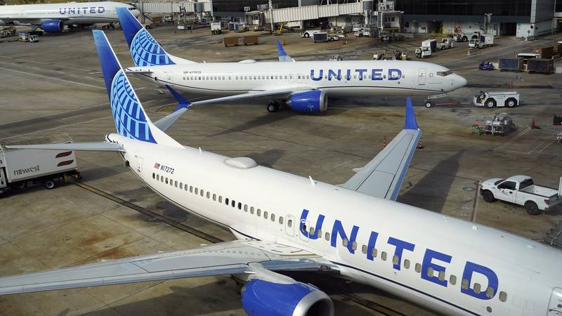 A United Airlines plane is pushed from the gate at George Bush Intercontinental Airport,...