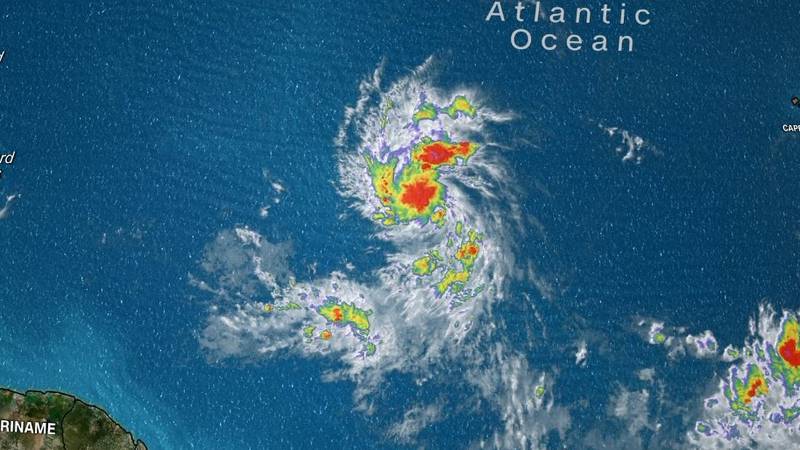 Tropical Storm Lee strengthened into a hurricane on Wednesday as it churned through the open...